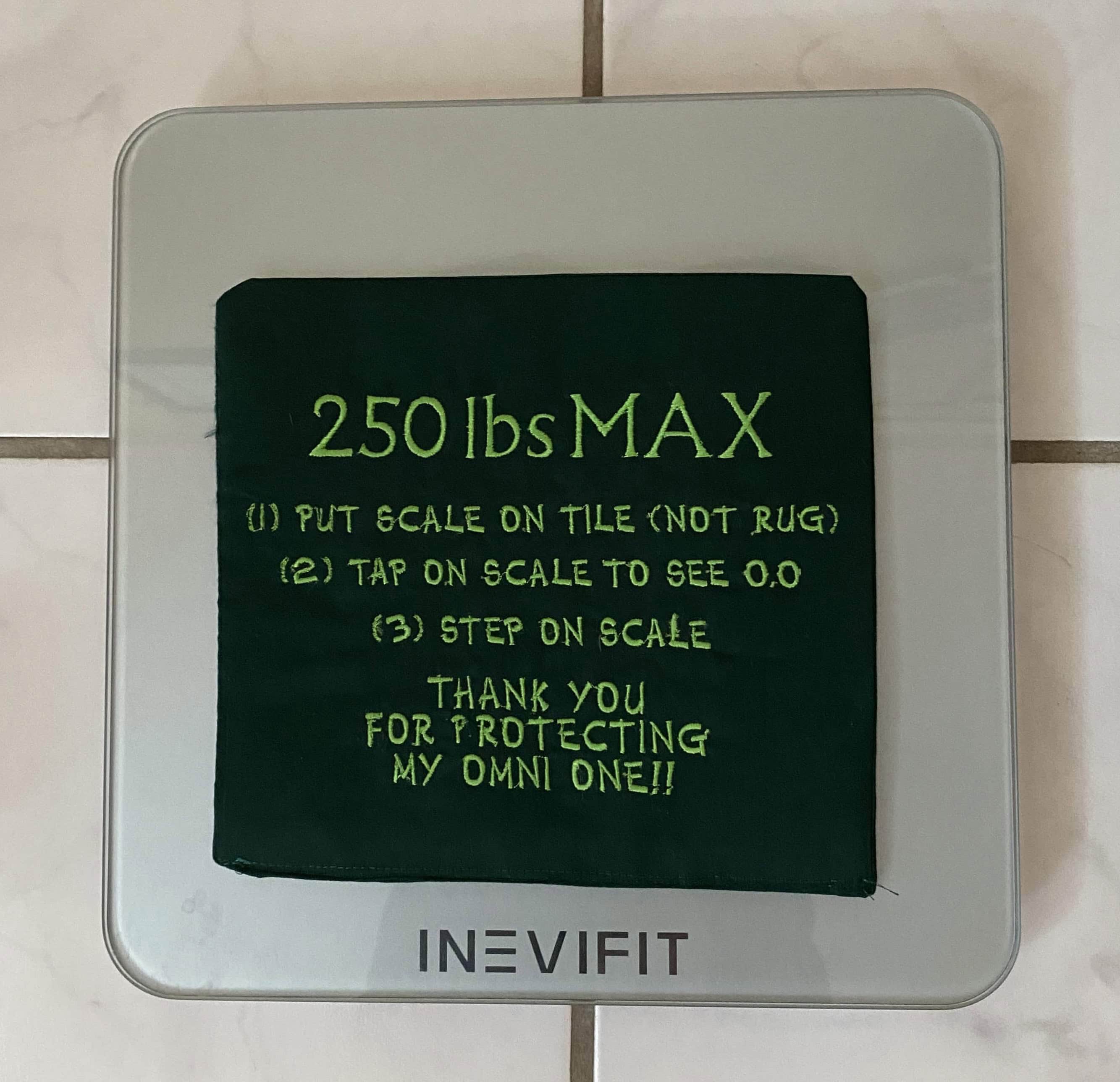 scale cover indicating max weight for Omni One